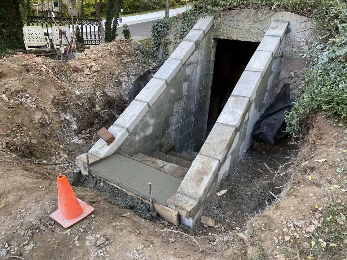 Block walls for a cellar entrance going in, one of our jobs